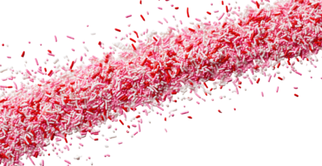 Pink and white sprinkles in a diagonal stream against a black background
