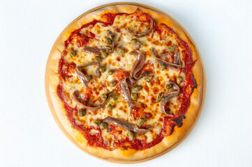 Classic Italian Marinara pizza with fresh tomato sauce, melted mozzarella, anchovies, and capers, captured from above on a white background. Natural light enhances this popular pizzeria street food di