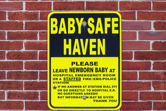 Sign reading Baby Safe Haven at fire station offering help to those who can not take care of their baby.