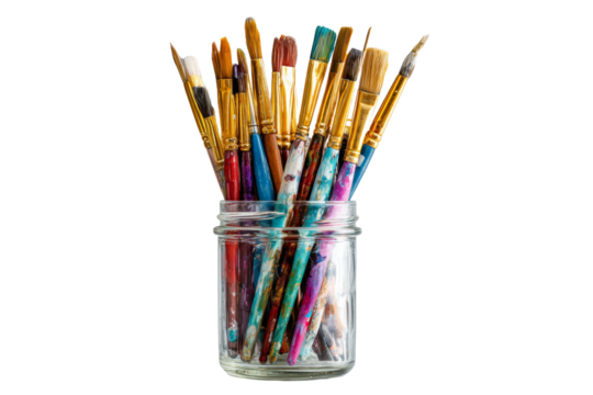 A jar full of paintbrushes of various colors