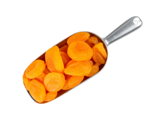 Vibrant dried apricots scooped in a metal server creating a delightful healthy snack presentation