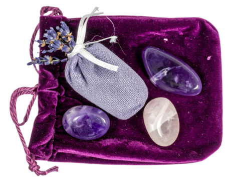 Amethyst crystals and lavender sachet nestled in velvet bag, ideal for wellness and spa themes