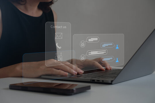 AI Chatbot Virtual Assistant for Online Customer Service and CRM Communication. Businesswoman using a laptop computer with AI agent for real-time automatic online customer support, CRM management.
