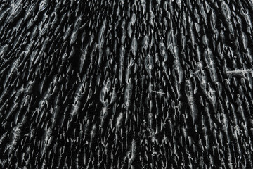 Patterns on abstract glass. Damage to glass. Broken or damaged background on a glass wall.