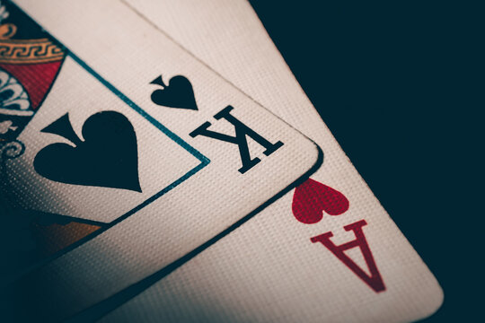Ace and king poker cards. Two cards king of spades and ace of hearts. Nuts hand to win. Luck in the game of blackjack.