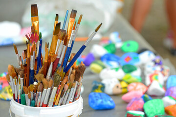 box with art brushes many on color background drawing art hobby passion