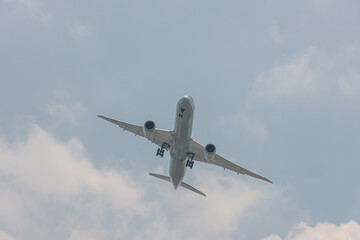 Jet Aircraft Descending At Airport During Summer