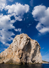 Punta Giglio promontory from the sea. Alghero, SS, Sardinia, Italy