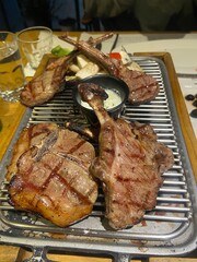Grilled Lamb Chop Platter with Roasted Garlic and Vegetables