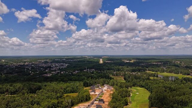 Hyperlapse aerial footage of the clouds rolling over Evans town in Columbia County, Georgia, USA