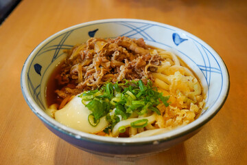 japanese udon noodle with beef and soft boiled egg - nikutama 