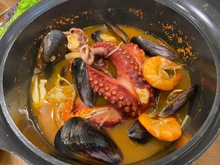 Spicy Korean Seafood Noodle Soup Jjamppong with Whole Octopus