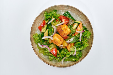 A Vibrant and Fresh Salad Dish Featuring Crisp Greens, Colorful Vegetables, and Golden-Crusted Protein, Perfect for a Healthy Meal Option.