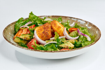 Crisp Green Salad with Golden Fried Balls, Fresh Vegetables, and a Burst of Color in a Rustic Bowl