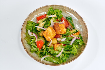 A Delicious Salad Bowl Featuring Fresh Vegetables, Crispy Tofu, and a Colorful Medley of Ingredients for a Healthy Meal Experience