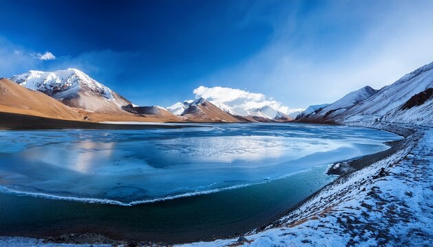 frozen alpine lake surrounded by rugged peaks at nyenpo yutse geological park in amdo tibet showcasing pristine wilderness and dramatic himalayan landscapes