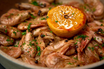 Sautéed Shrimp Garnished with Grilled Citrus and Fresh Herbs, Showcasing a Flavorful Culinary Delight Perfect for Any Occasion