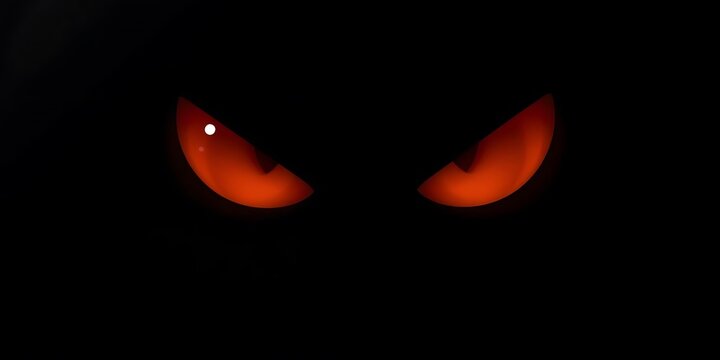 Menacing red eyes glowing intensely from a dark, black background.