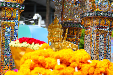 Marigold flower garlands offered for worship at the Erawan Shrine in Bangkok, Thailand.