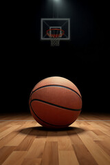 Obraz premium Basketball Alone on Empty Indoor Court Under Lights