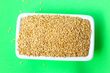 Organic golden flaxseeds, rich in omega-3, fiber, and antioxidants