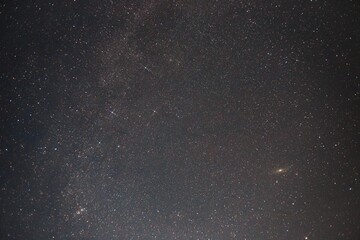 Cassiopia and the Andromeda galaxy in the night sky