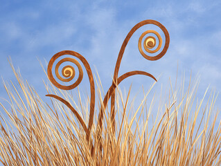 gentle wind creating spirals in tall dry grass