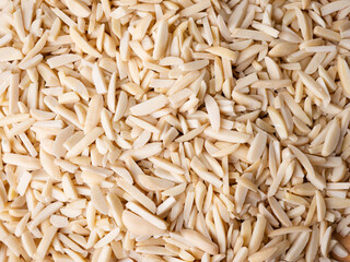 White Almond Stick set on wooden board and white background.