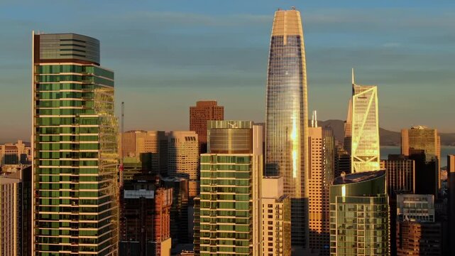 San Francisco skyline at sunset, showcasing modern architecture. The photo captures the city's vibrant urban landscape in the USA.