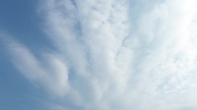 Bright blue clouds drifted by in the afternoon