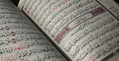 Naklejka premium Jakarta,indonesia - april 7 2021 : Quran,Al-qur'an. Islamic background for Eid al Fitr Eid al Adha. An open page. White background