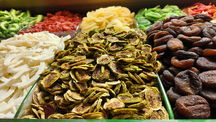 Dried fruits and vegetables displayed at a market