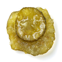 Close-up of a Pickled Cucumber Slice with Brine