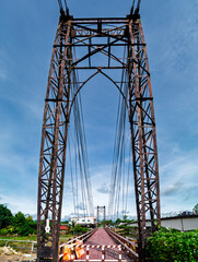 Fototapeta premium Ngao River Bridge, is the old suspension bridge in Ngao city, Lampang province.