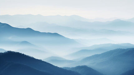 Misty mountain landscape with layers fading into fog