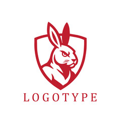 Shield-shaped red and white logo featuring a fierce, confident rabbit with intense eyes, exuding strength and competitive spirit in a bold sports team style.