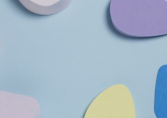 Pastel shapes on baby blue backdrop