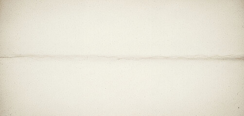 A light beige paper background with a horizontal crease or fold line, offering a clean organic texture with subtle imperfection that adds character to minimalist layouts or soft overlays.