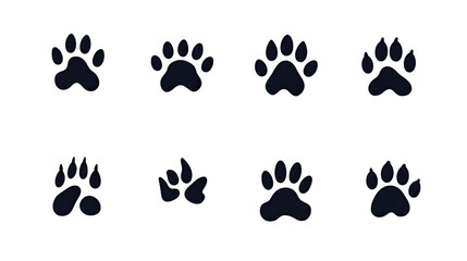 Fototapeta premium Animal paw prints in simple black and white minimalist icon style isolated on white background