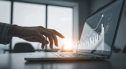Businesswoman analyzing financial data on a laptop with a glowing growth chart and upward arrow in a modern office