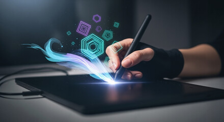 Digital artist's hand with a stylus creating glowing futuristic neon shapes on a graphics tablet