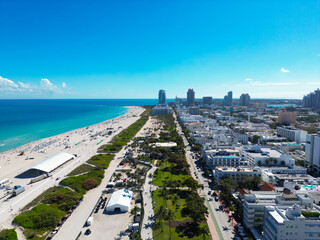 Fototapeta premium Miami Beach under the summer sky with clouds. South coastal in Miami Beach. Skyscrapers in Miami Beach, aerial panorama. Travel dreams in Florida. Miami Beach cityscape.