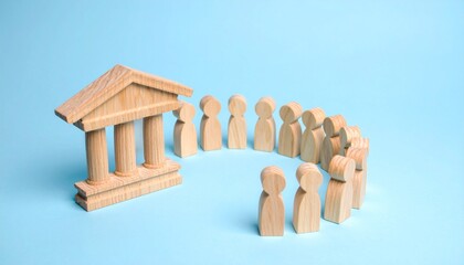 Wooden figures standing before classical building symbolizing law and government