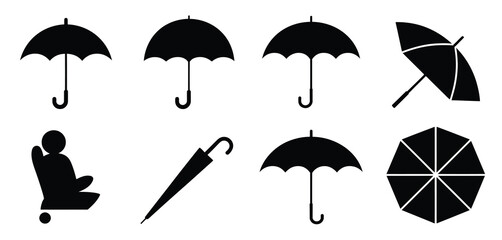 Collection of black umbrella silhouettes in various open and closed positions and a person sitting