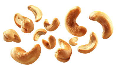 falling cashew nuts isolated on white background