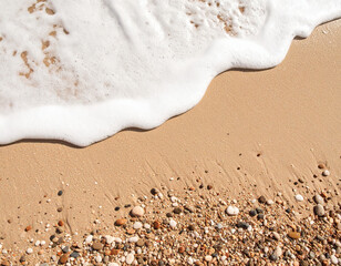 Ocean Wave Foam at Shoreline: White Sea Bubbles Gently Touching Sandy Beach with Natural Texture and Calm Atmosphere for Coastal Design, Relaxation Concept, and Summer Background