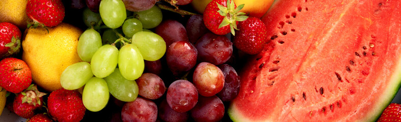 Variety of fruits and berries. Fresh raw  fruits.