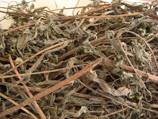 Dried stems and leaves of Eclipta prostrata, a Korean medicinal herb used for hair loss and liver detoxification. Photographed in Korea.
