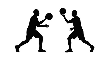 Two basketball players passing the ball to each other silhouette © rsvect02