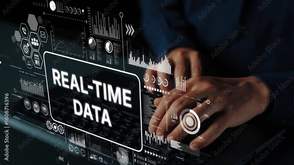 Poster hands typing on laptop with digital graphics representing real-time data analysis and technology con